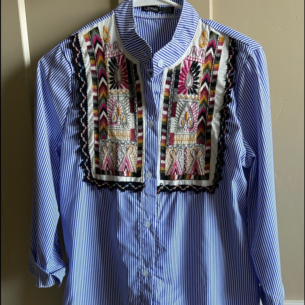Embroidered shirt dress.